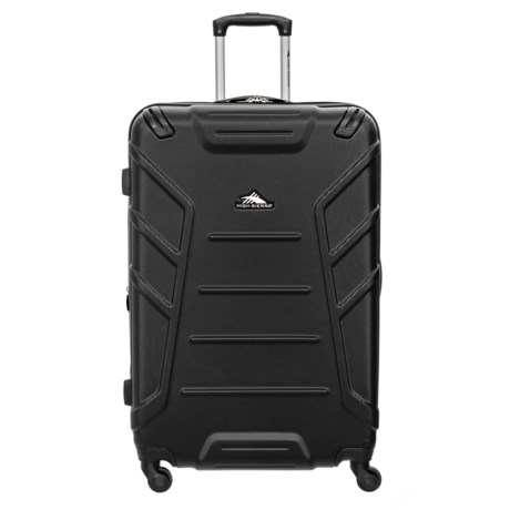 CLOSEOUTS. High Sierraand#39;s Rocshell spinner suitcase offers hard-sided protection that rolls effortlessly. The expandable main compartment has a zip divider so you stay organized, as well as a lined interior with multiple compartments. Available Colors: BLACK, MERCURY/RED LINE, MIDNIGHT/VIVID.