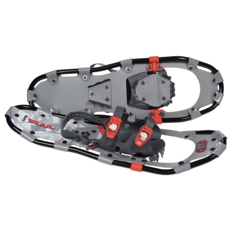 CLOSEOUTS. Yukon Charlieand#39;s 825 Trail snowshoes let you stroll comfortably through flat and rolling terrain, snowy woods and packed backcountry trails. The dual-ratcheting binding straps fit most footwear, and the rigid steel crampons help you climb confidently. Available Colors: BLACK, BLUE.