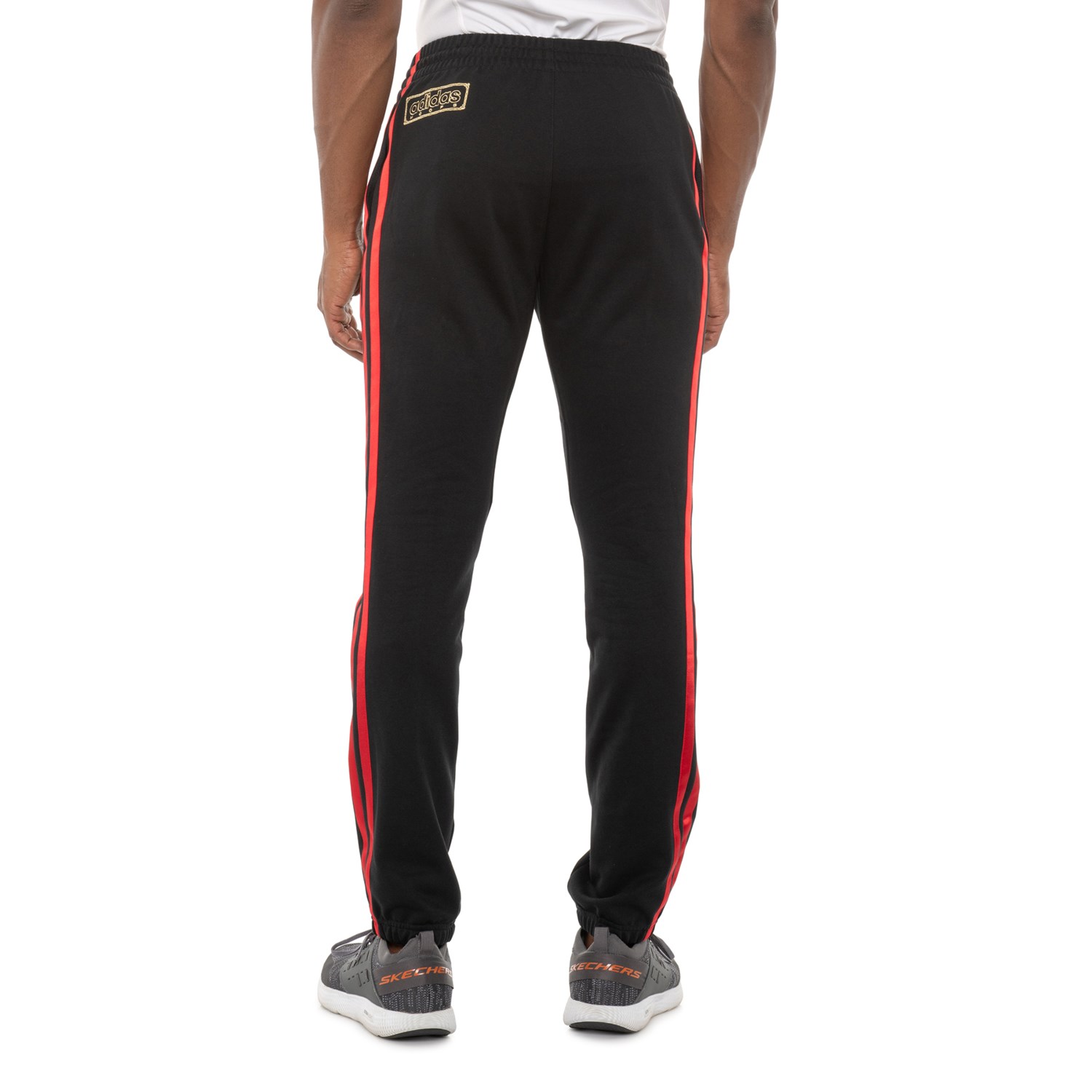 red three stripe pants
