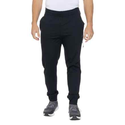 ASICS Brushed Knit Joggers with Side Zip Pocket in Black