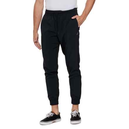 ASICS Woven Core Joggers in Black