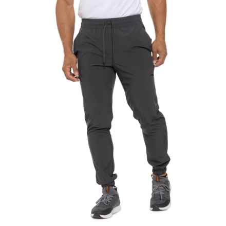 ASICS Woven Side Zip Pocket Joggers in Graphite Grey